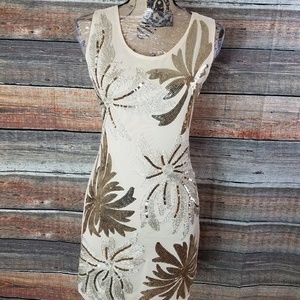 Sequined and embroidered dress or long tunic.